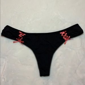 Black sexy thong with peach colour lace